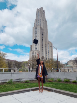 Betsy tosses her graduation cap at Pitt