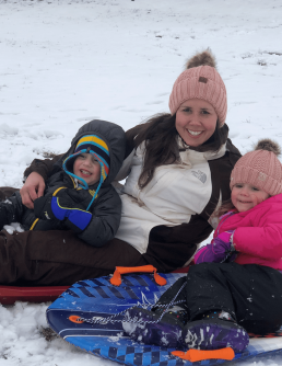 Jeni in the snow with her kids