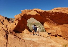 Family standing in Arches
